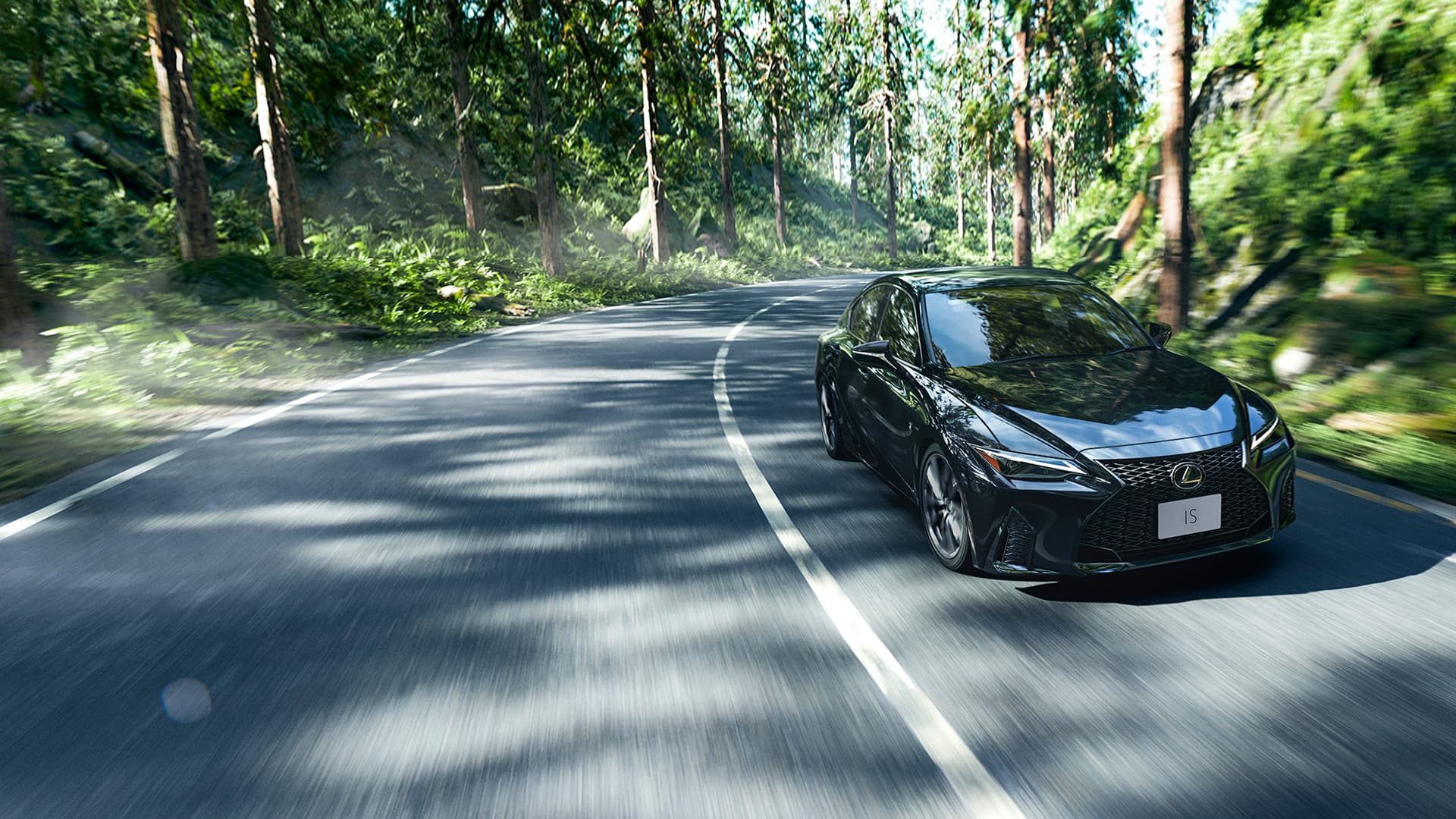 Black Lexus IS being driven on the road